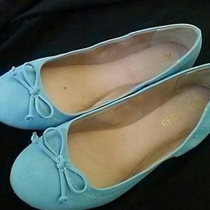 Blue slip on shoes with cute bow